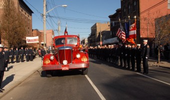 #3 The body was carried to the church on a restored fire truck funeral caisson